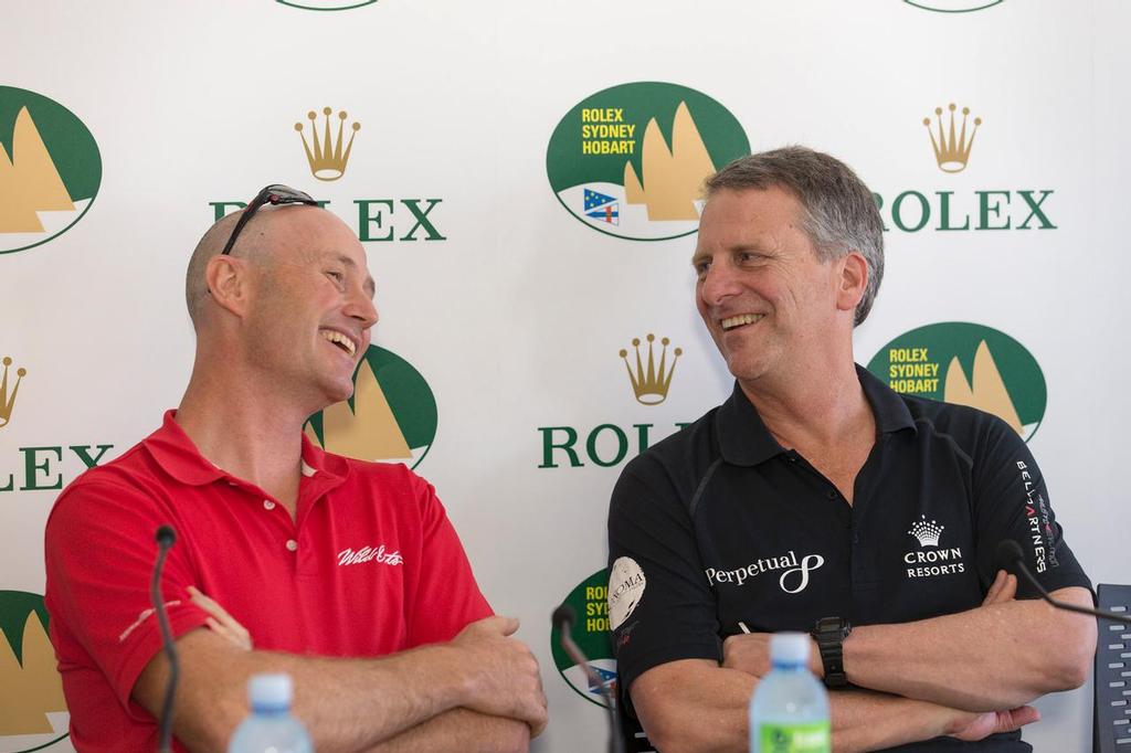 Tom Addis and Stan Honey comparing notes on the long range weather forecast - Rolex Sydney to Hobart 2013 © Andrea Francolini